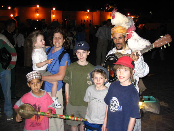 5125-marrakech-Jemaa-el-Fna-chicken-head-guy-apr13-2005