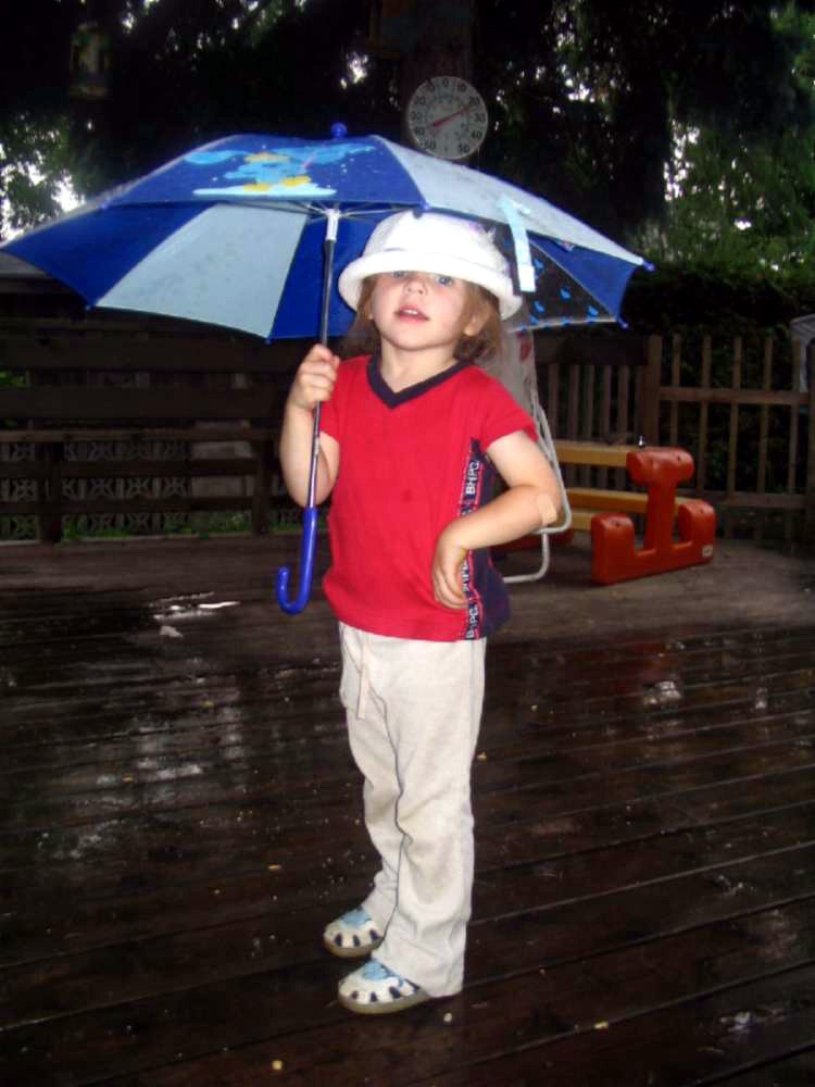 Grace under umbrella
