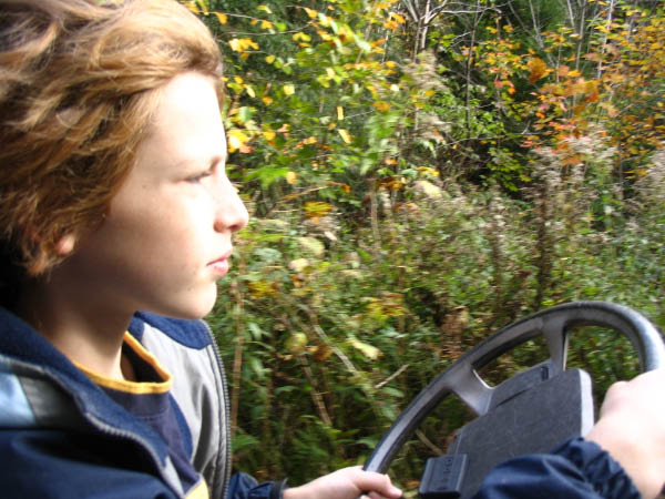 8669-farm-tim-driving-golf-cart-oct9-2005
